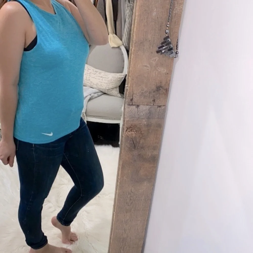 Nike Dri fit turquoise tank top size medium